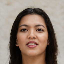 Joyful asian young-adult female with long  brown hair and brown eyes