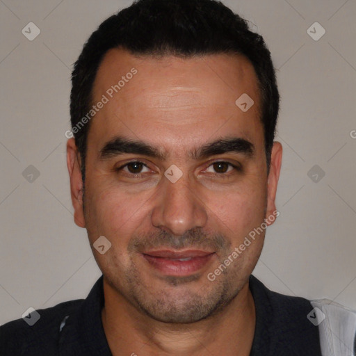 Joyful white adult male with short  black hair and brown eyes