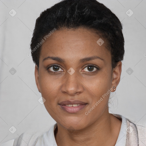 Joyful black young-adult female with short  black hair and brown eyes