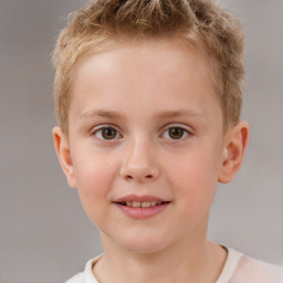 Joyful white child male with short  brown hair and brown eyes