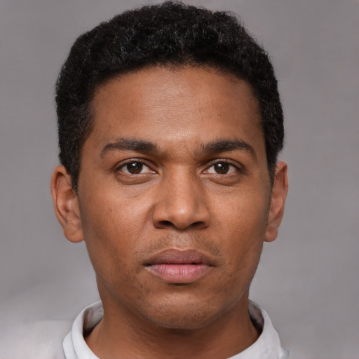 Neutral black young-adult male with short  brown hair and brown eyes