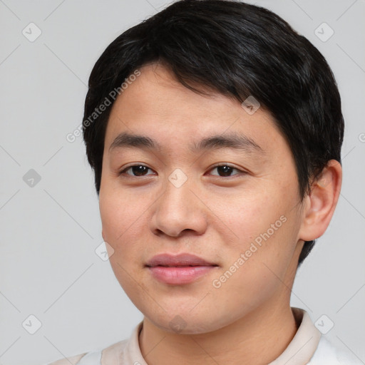 Joyful asian young-adult male with short  brown hair and brown eyes