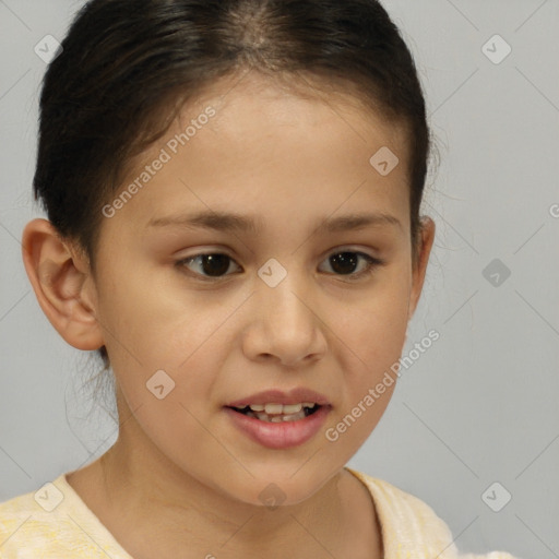 Joyful white child female with short  brown hair and brown eyes