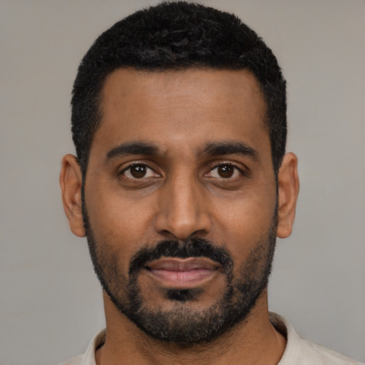 Neutral black young-adult male with short  black hair and brown eyes