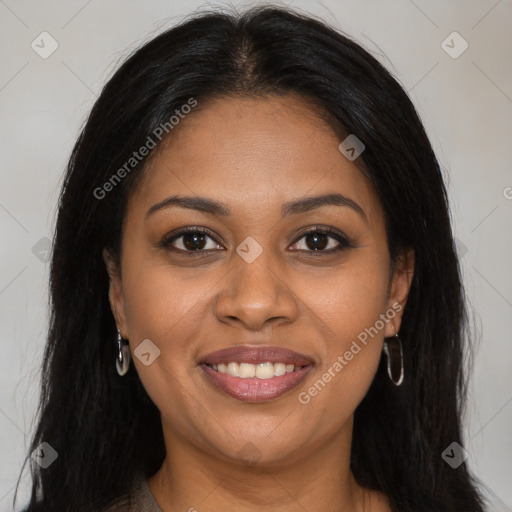 Joyful black young-adult female with long  brown hair and brown eyes