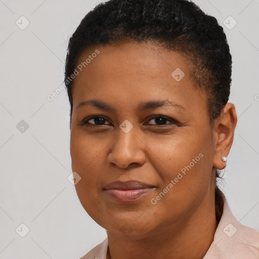 Joyful black young-adult female with short  brown hair and brown eyes