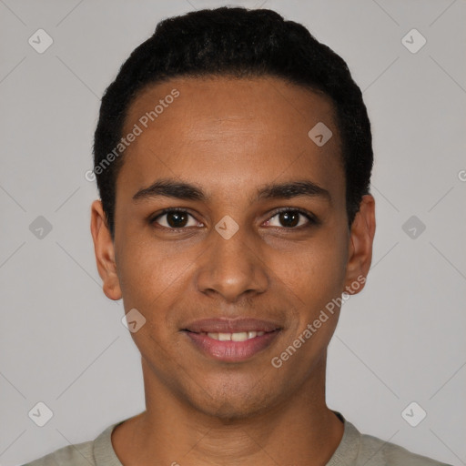 Joyful black young-adult male with short  black hair and brown eyes