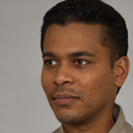 Neutral black young-adult male with short  black hair and brown eyes