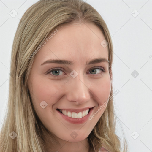 Joyful white young-adult female with long  brown hair and blue eyes