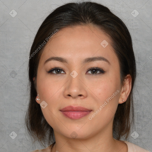 Joyful asian young-adult female with medium  brown hair and brown eyes