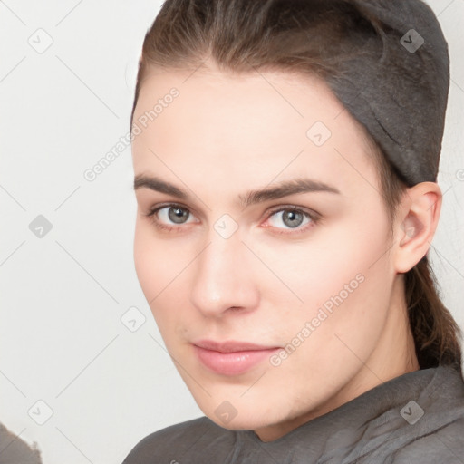 Neutral white young-adult female with short  brown hair and brown eyes