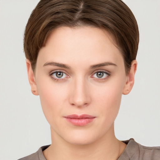 Neutral white young-adult female with short  brown hair and brown eyes