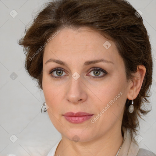 Joyful white young-adult female with medium  brown hair and green eyes