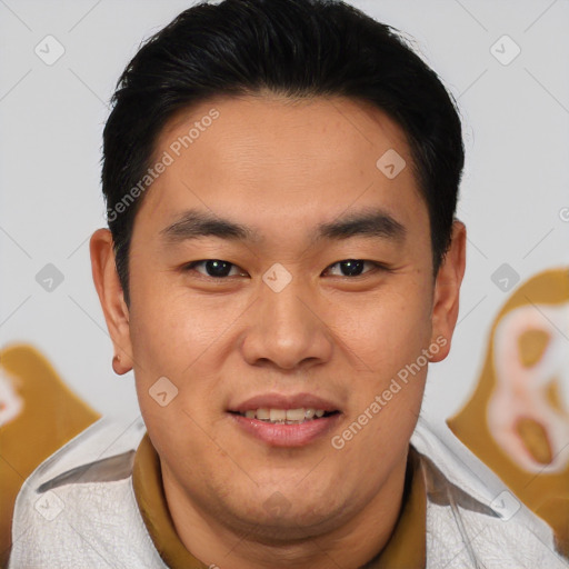 Joyful white young-adult male with short  black hair and brown eyes