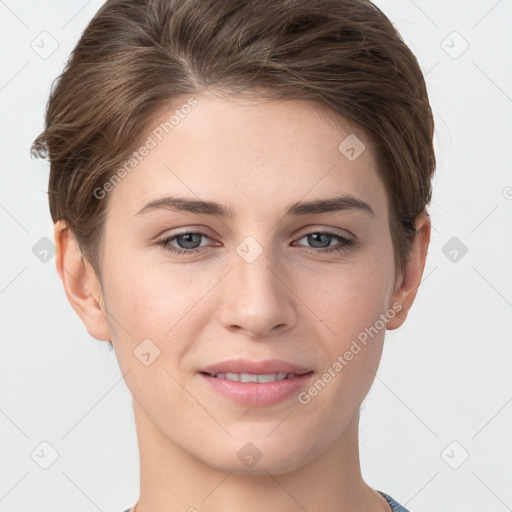 Joyful white young-adult female with short  brown hair and grey eyes