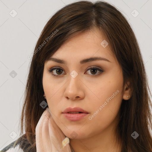 Neutral white young-adult female with long  brown hair and brown eyes