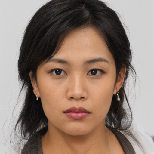 Neutral asian young-adult female with medium  black hair and brown eyes