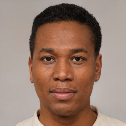 Neutral latino adult male with short  black hair and brown eyes