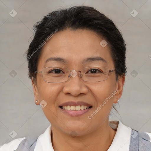 Joyful white adult female with short  brown hair and brown eyes