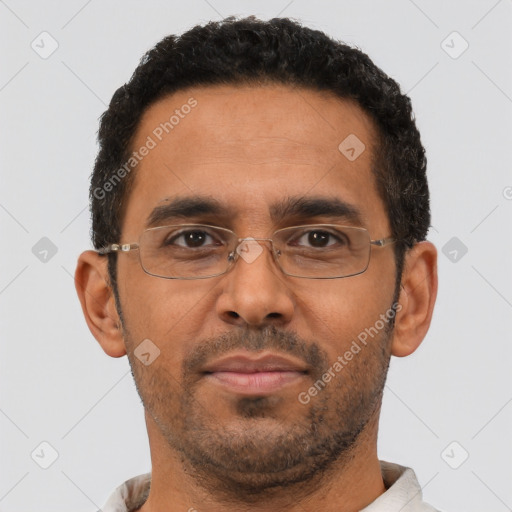 Neutral black adult male with short  black hair and brown eyes