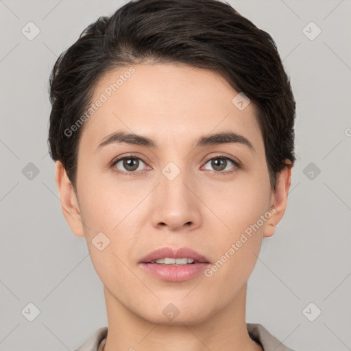 Neutral white young-adult female with short  brown hair and brown eyes