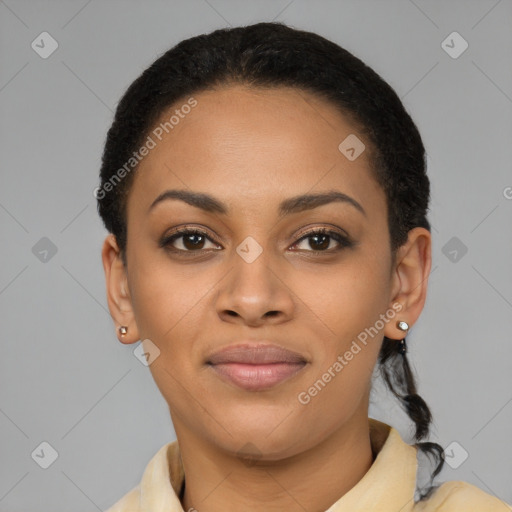 Joyful latino young-adult female with short  black hair and brown eyes