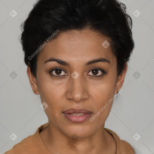 Joyful latino young-adult female with short  brown hair and brown eyes