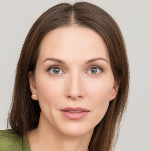 Neutral white young-adult female with long  brown hair and grey eyes