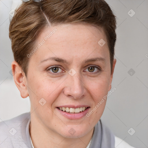 Joyful white adult female with short  brown hair and grey eyes