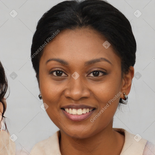 Joyful black young-adult female with medium  brown hair and brown eyes