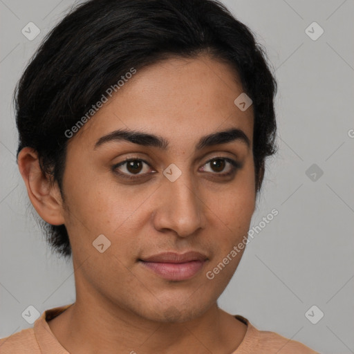 Joyful latino young-adult female with short  brown hair and brown eyes