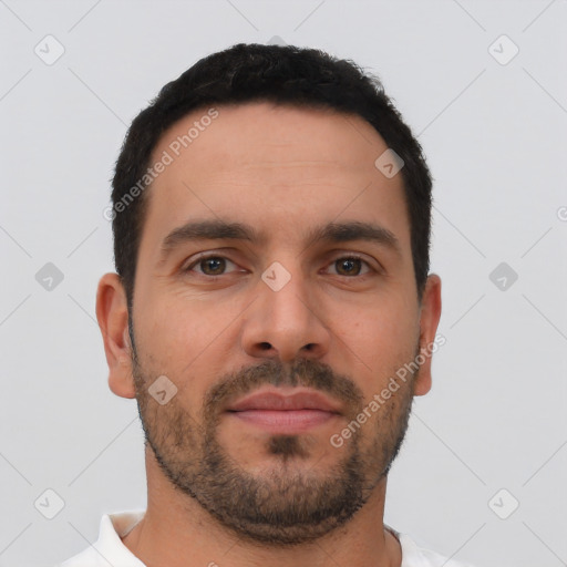 Neutral white young-adult male with short  black hair and brown eyes
