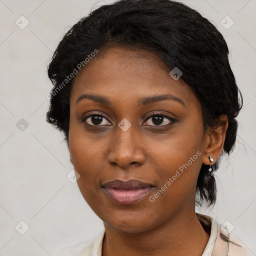 Joyful black young-adult female with medium  black hair and brown eyes