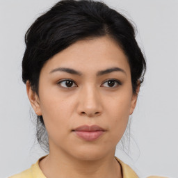 Neutral asian young-adult female with medium  black hair and brown eyes