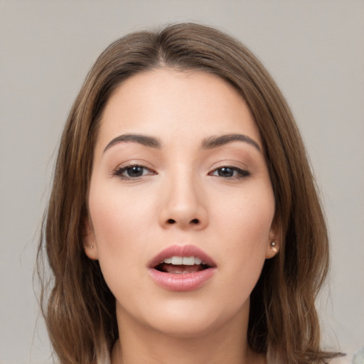 Neutral white young-adult female with medium  brown hair and brown eyes