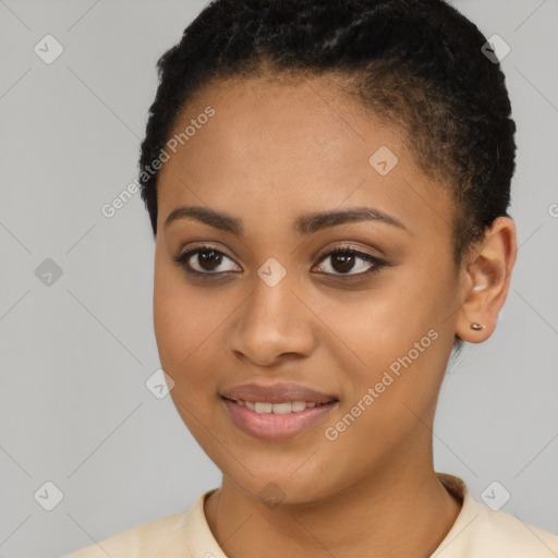 Joyful black young-adult female with short  brown hair and brown eyes