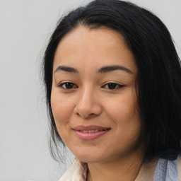 Joyful asian young-adult female with medium  black hair and brown eyes