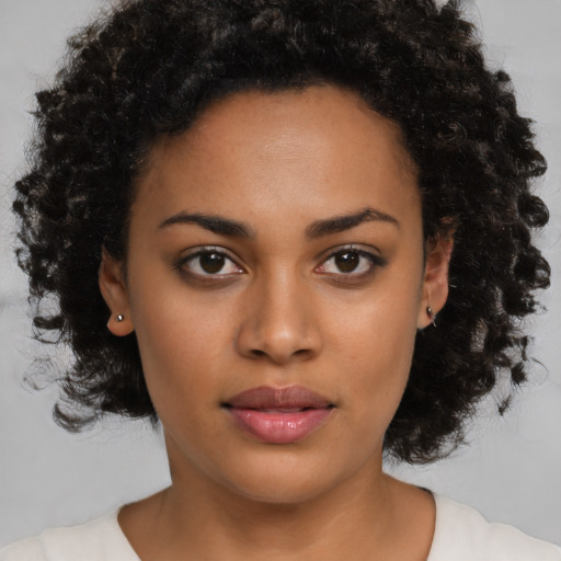 Neutral latino young-adult female with medium  brown hair and brown eyes