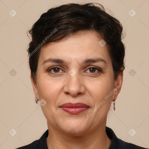 Joyful white adult female with short  brown hair and brown eyes