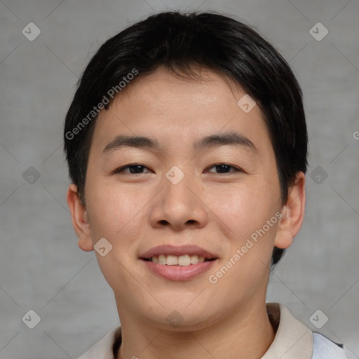 Joyful asian young-adult male with short  brown hair and brown eyes