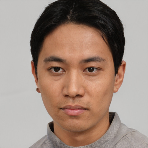 Neutral asian young-adult male with short  black hair and brown eyes