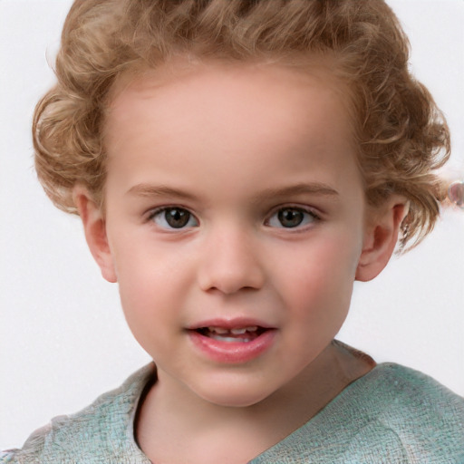 Joyful white child female with short  brown hair and blue eyes