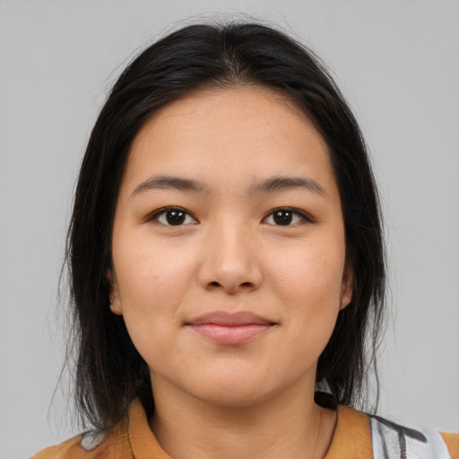 Neutral latino young-adult female with medium  brown hair and brown eyes