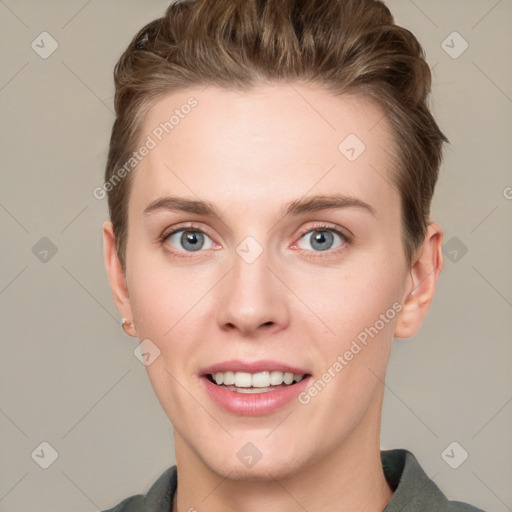 Joyful white young-adult female with short  brown hair and grey eyes