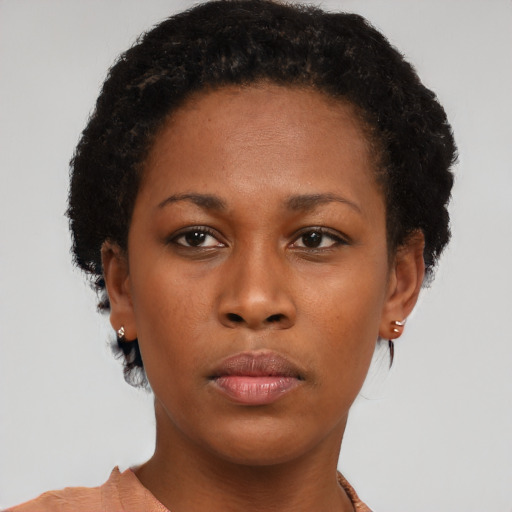 Neutral black young-adult female with short  black hair and brown eyes