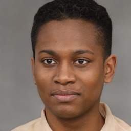 Joyful latino young-adult male with short  brown hair and brown eyes