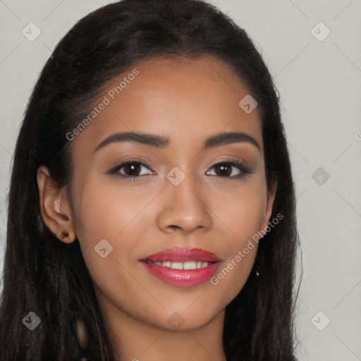 Joyful latino young-adult female with long  brown hair and brown eyes