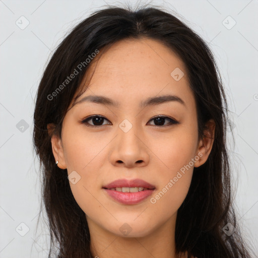 Joyful asian young-adult female with long  brown hair and brown eyes