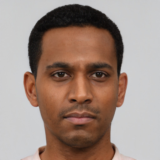 Neutral black young-adult male with short  black hair and brown eyes