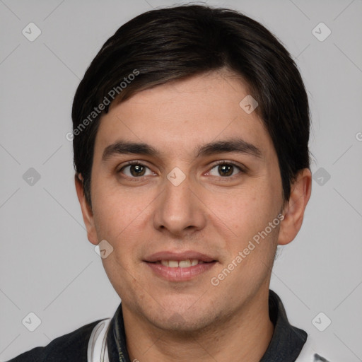 Joyful white young-adult male with short  black hair and brown eyes